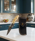Handcrafted Damascus Steel Folding Knife with Natural Bone Handle & Premium Leather Sheath