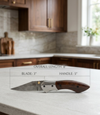 Artisan Damascus Steel Folding Knife with Premium Rosewood Handle & Navy Blue Leather Sheath